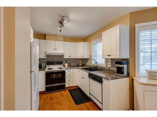 1-533 14 Avenue Sw, Calgary, AB - Indoor Photo Showing Kitchen With Double Sink