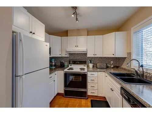 1-533 14 Avenue Sw, Calgary, AB - Indoor Photo Showing Kitchen With Double Sink