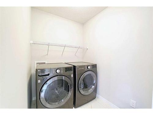 36 Belmont Terrace Sw, Calgary, AB - Indoor Photo Showing Laundry Room