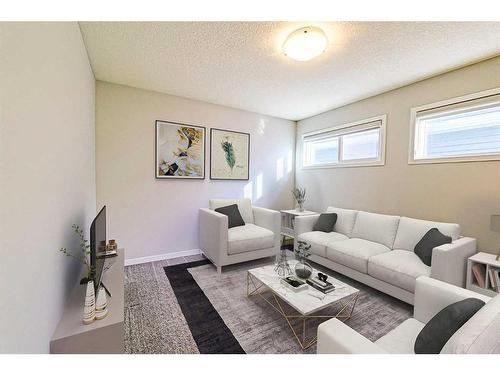 36 Belmont Terrace Sw, Calgary, AB - Indoor Photo Showing Living Room