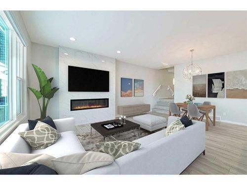 36 Belmont Terrace Sw, Calgary, AB - Indoor Photo Showing Living Room With Fireplace