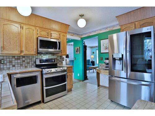 47 Edenwold Crescent Nw, Calgary, AB - Indoor Photo Showing Kitchen With Stainless Steel Kitchen