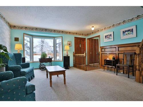 47 Edenwold Crescent Nw, Calgary, AB - Indoor Photo Showing Living Room