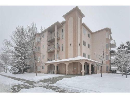 403-16 Poplar Avenue, Okotoks, AB - Outdoor With Balcony With Facade