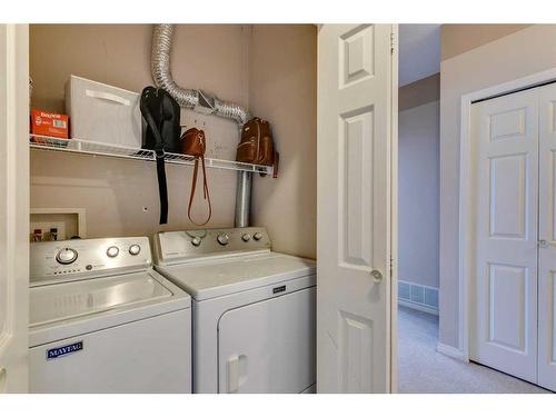 403-16 Poplar Avenue, Okotoks, AB - Indoor Photo Showing Laundry Room