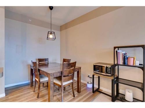 403-16 Poplar Avenue, Okotoks, AB - Indoor Photo Showing Dining Room