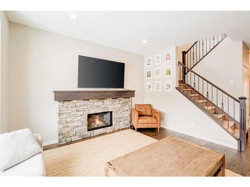 17 Marquis Heights Se, Calgary, AB - Indoor Photo Showing Living Room With Fireplace