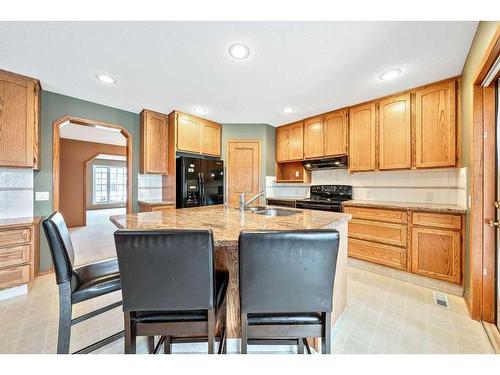 121 Mt Assiniboine Place Se, Calgary, AB - Indoor Photo Showing Kitchen With Double Sink