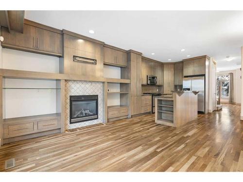 3-2421 29 Street Sw, Calgary, AB - Indoor Photo Showing Other Room With Fireplace