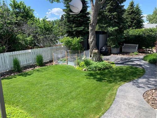 5131 Baines Road Nw, Calgary, AB - Outdoor With Backyard