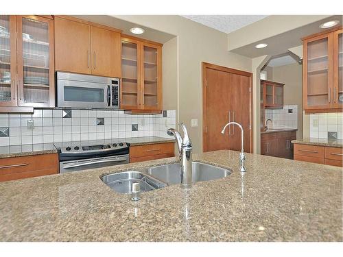 2193 Vimy Way Sw, Calgary, AB - Indoor Photo Showing Kitchen With Double Sink With Upgraded Kitchen