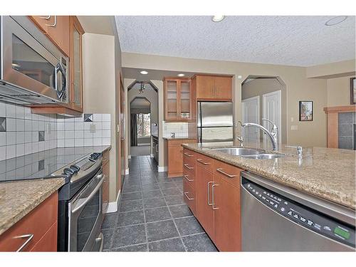 2193 Vimy Way Sw, Calgary, AB - Indoor Photo Showing Kitchen With Double Sink