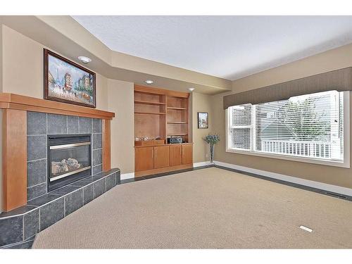 2193 Vimy Way Sw, Calgary, AB - Indoor With Fireplace