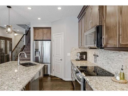 116 Auburn Glen Heights Se, Calgary, AB - Indoor Photo Showing Kitchen With Double Sink With Upgraded Kitchen