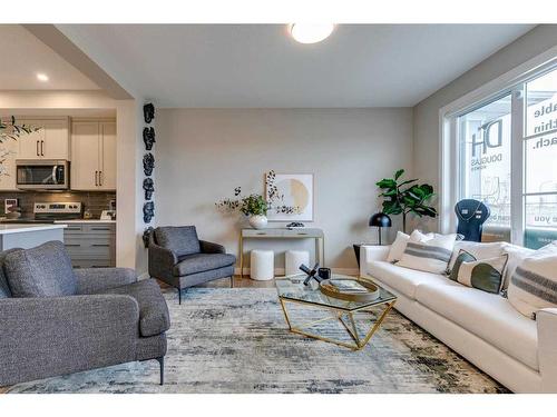 403 Sora Boulevard Se, Calgary, AB - Indoor Photo Showing Living Room