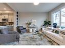 403 Sora Boulevard Se, Calgary, AB  - Indoor Photo Showing Living Room 