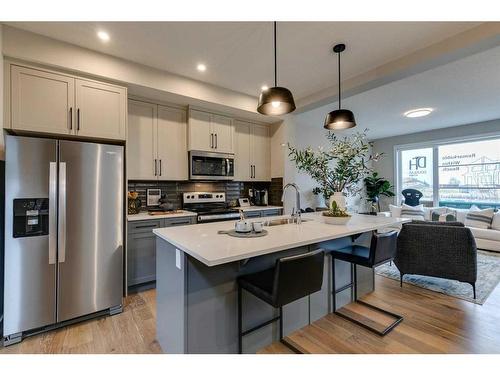 403 Sora Boulevard Se, Calgary, AB - Indoor Photo Showing Kitchen With Stainless Steel Kitchen