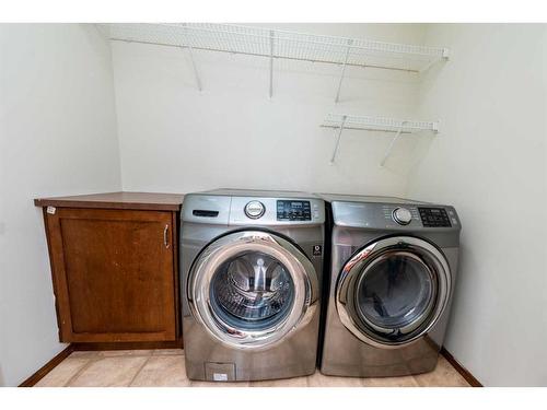 126 Panamount Street Nw, Calgary, AB - Indoor Photo Showing Laundry Room