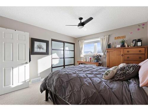 63 Coverdale Way Ne, Calgary, AB - Indoor Photo Showing Bedroom