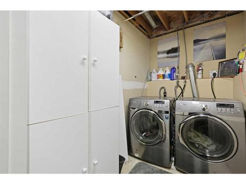 63 Coverdale Way Ne, Calgary, AB - Indoor Photo Showing Laundry Room