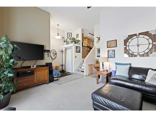 63 Coverdale Way Ne, Calgary, AB - Indoor Photo Showing Living Room