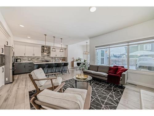 166 Creekstone Way Sw, Calgary, AB - Indoor Photo Showing Living Room