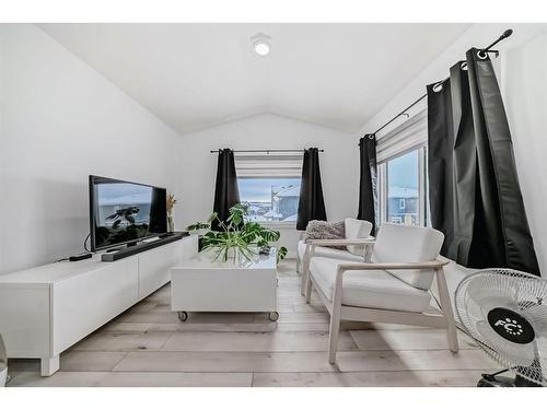 166 Creekstone Way Sw, Calgary, AB - Indoor Photo Showing Living Room