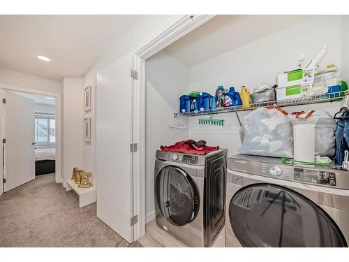 166 Creekstone Way Sw, Calgary, AB - Indoor Photo Showing Laundry Room