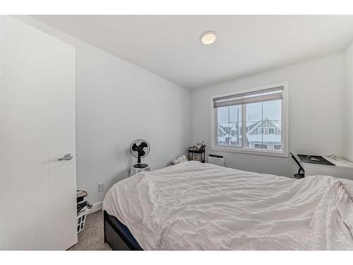 166 Creekstone Way Sw, Calgary, AB - Indoor Photo Showing Bedroom