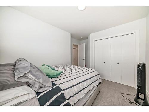 166 Creekstone Way Sw, Calgary, AB - Indoor Photo Showing Bedroom