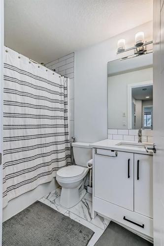 166 Creekstone Way Sw, Calgary, AB - Indoor Photo Showing Bathroom