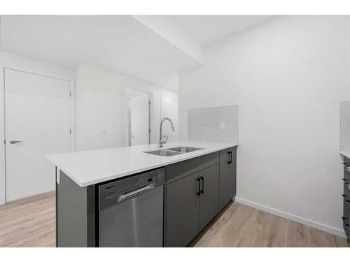 46 Cityline Mount Ne, Calgary, AB - Indoor Photo Showing Kitchen With Double Sink