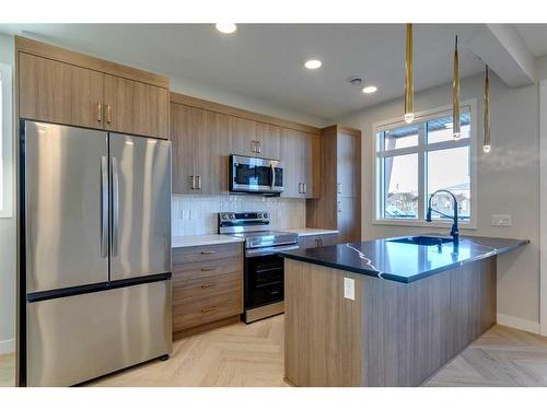 602 Seton Circle Se, Calgary, AB - Indoor Photo Showing Kitchen With Upgraded Kitchen