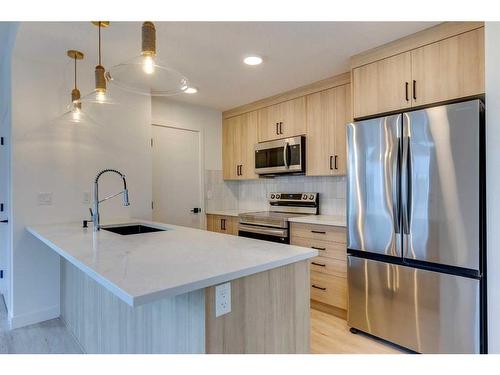 14778 1St Street Nw, Calgary, AB - Indoor Photo Showing Kitchen With Upgraded Kitchen