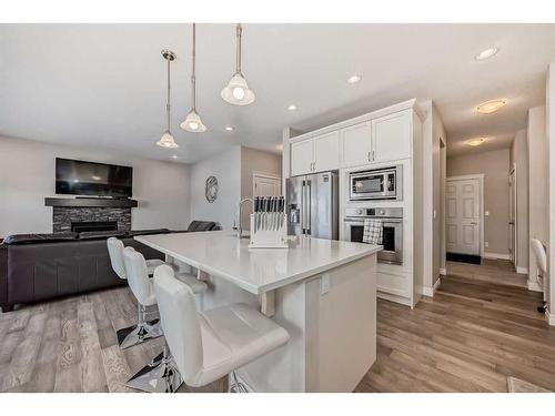 35 Legacy Link Se, Calgary, AB - Indoor Photo Showing Kitchen With Upgraded Kitchen