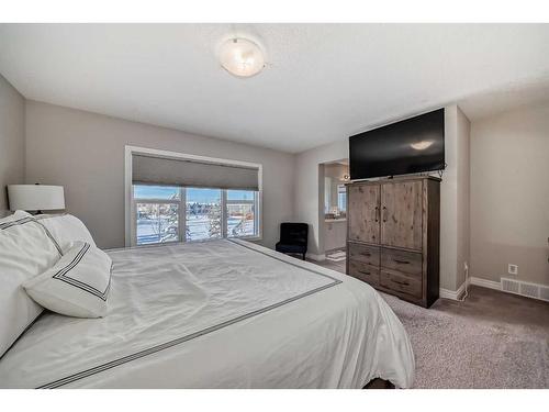 35 Legacy Link Se, Calgary, AB - Indoor Photo Showing Bedroom