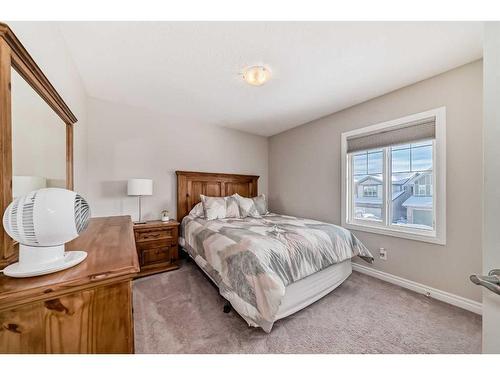 35 Legacy Link Se, Calgary, AB - Indoor Photo Showing Bedroom