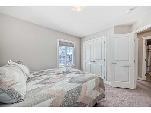 35 Legacy Link Se, Calgary, AB - Indoor Photo Showing Bedroom