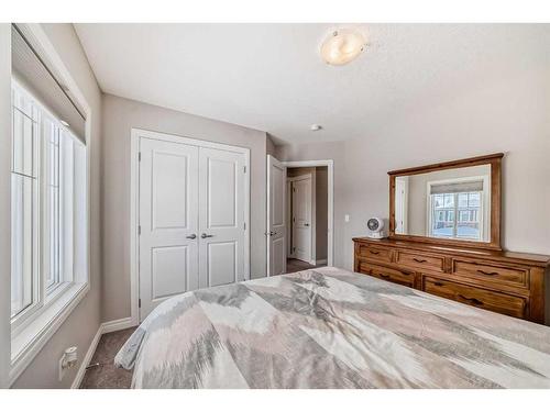 35 Legacy Link Se, Calgary, AB - Indoor Photo Showing Bedroom