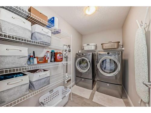 35 Legacy Link Se, Calgary, AB - Indoor Photo Showing Laundry Room