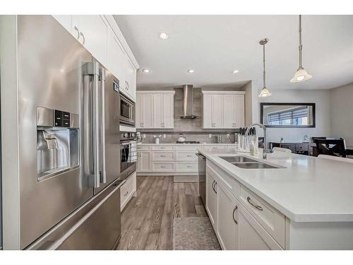 35 Legacy Link Se, Calgary, AB - Indoor Photo Showing Kitchen With Double Sink With Upgraded Kitchen