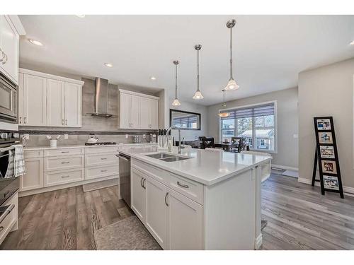 35 Legacy Link Se, Calgary, AB - Indoor Photo Showing Kitchen With Double Sink With Upgraded Kitchen