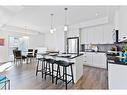 425-115 Sagewood Drive, Airdrie, AB  - Indoor Photo Showing Kitchen With Stainless Steel Kitchen With Upgraded Kitchen 