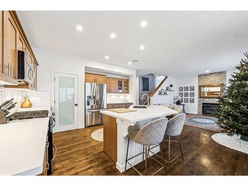 117 Drake Landing View, Okotoks, AB - Indoor Photo Showing Kitchen With Stainless Steel Kitchen With Upgraded Kitchen