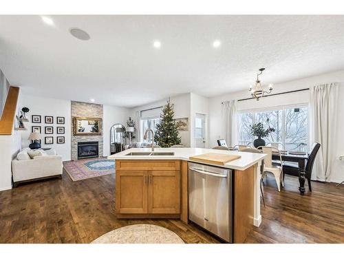 117 Drake Landing View, Okotoks, AB - Indoor With Fireplace