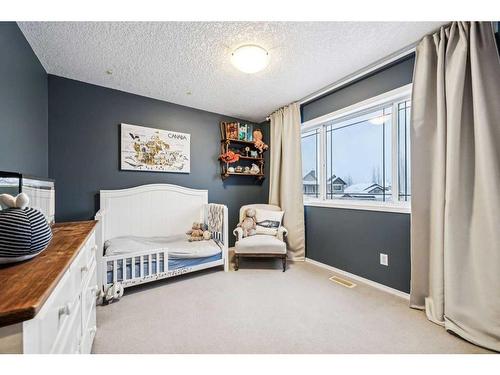 117 Drake Landing View, Okotoks, AB - Indoor Photo Showing Bedroom