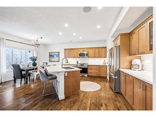 117 Drake Landing View, Okotoks, AB - Indoor Photo Showing Kitchen With Stainless Steel Kitchen