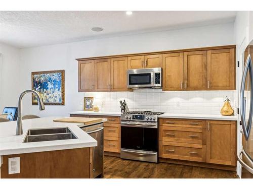 117 Drake Landing View, Okotoks, AB - Indoor Photo Showing Kitchen With Stainless Steel Kitchen With Double Sink