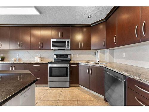 168 Edgebrook Park Nw, Calgary, AB - Indoor Photo Showing Kitchen With Stainless Steel Kitchen