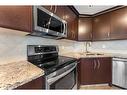 168 Edgebrook Park Nw, Calgary, AB  - Indoor Photo Showing Kitchen With Stainless Steel Kitchen With Double Sink 